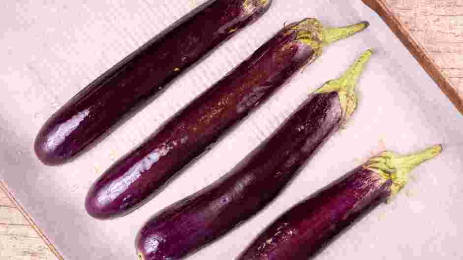 Japanese Eggplant Recipe: Place the eggplant flesh side down on the sheet pan.