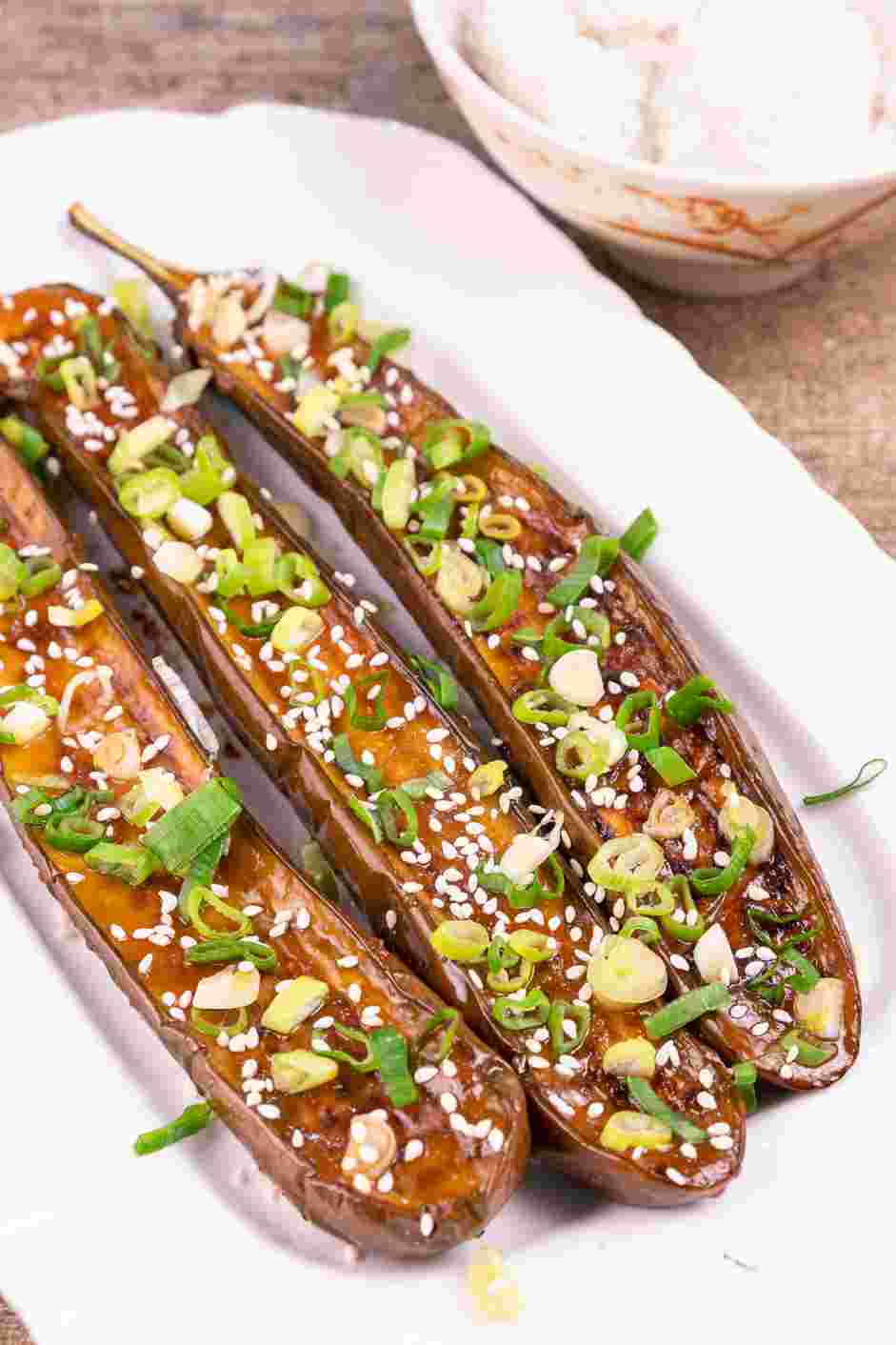 Japanese Eggplant Recipe: Garnish the eggplant with finely sliced scallions and sesame seeds.