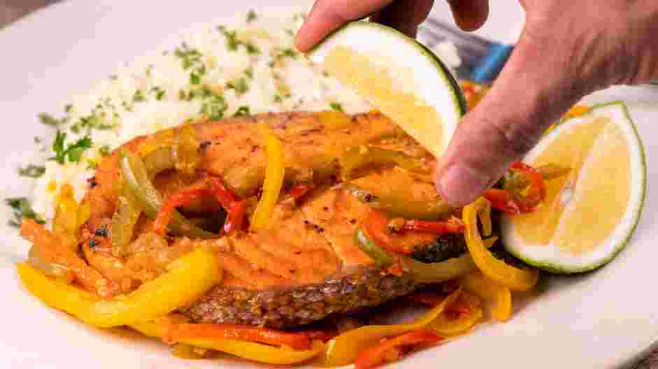 Salmon Steaks with Roasted Chile Medley and Turmeric Rice Recipe: Top the salmon and roasted peppers with lime juice.