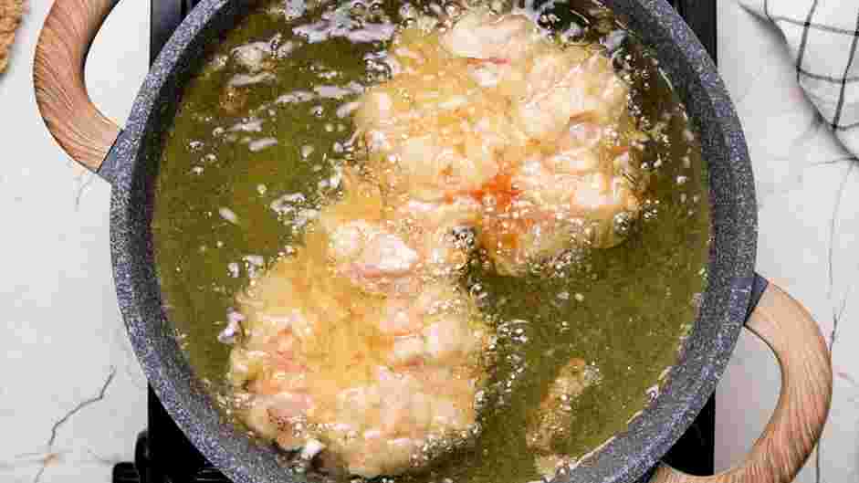 Honey Butter Chicken Biscuit Recipe: Raise the heat and heat the oil to 350°F.
