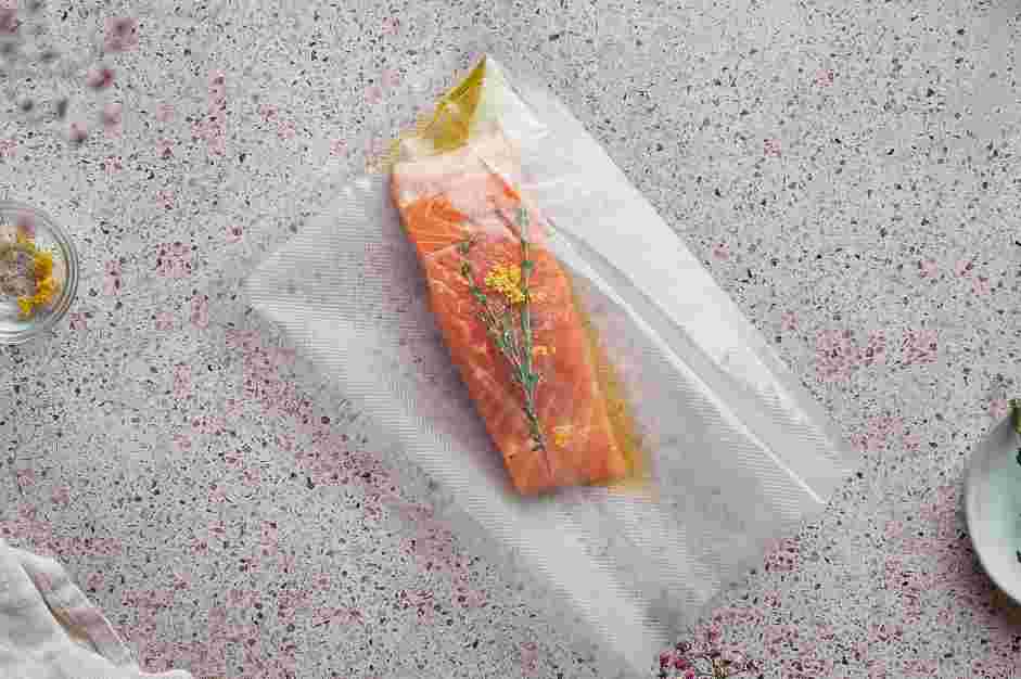 Sous Vide Salmon Recipe: Place the salmon fillets in a vacuum sealer bag or in a gallon-sized freezer zip lock bag.