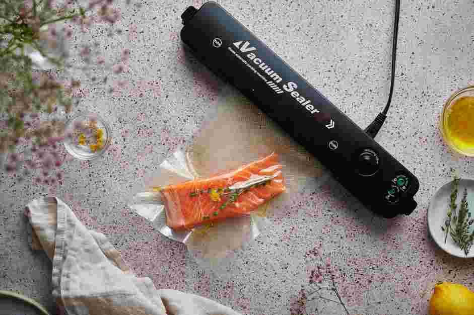 Sous Vide Salmon Recipe: If using a vacuum sealer, remove the air and seal the bag.