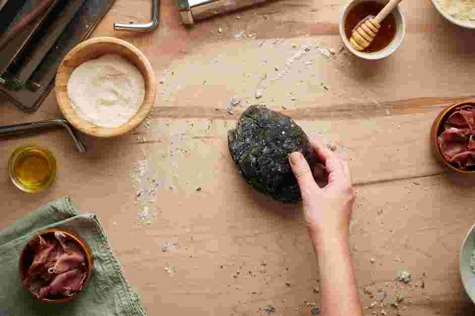 Squid Ink Pasta with Crispy Prosciutto and Truffle Honey Recipe: With a fork or your fingers, mix the eggs and ink until combined.