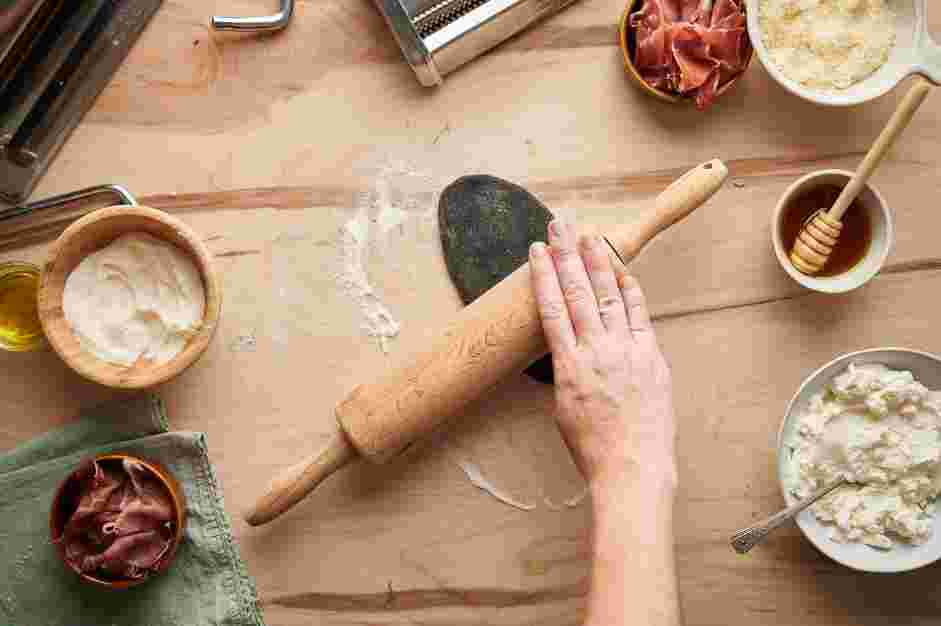 Squid Ink Pasta with Crispy Prosciutto and Truffle Honey Recipe: After 30 minutes, set up your pasta roller.