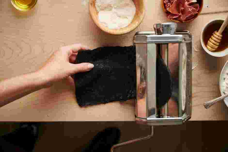 Squid Ink Pasta with Crispy Prosciutto and Truffle Honey Recipe: Run the disk through the widest setting of the pasta roller.