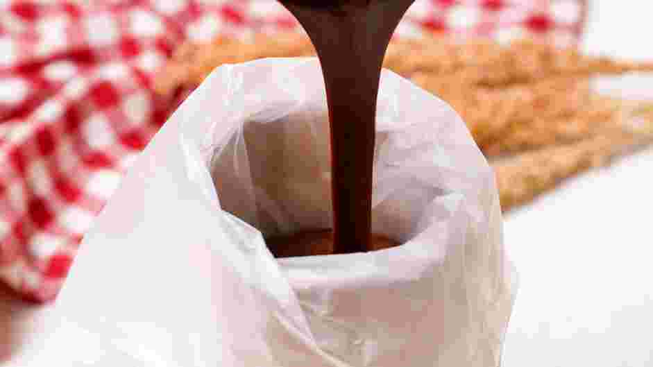 Brownie Bites Recipe: Let the ganache cool completely and transfer into a piping bag with your favorite medium size nozzle.