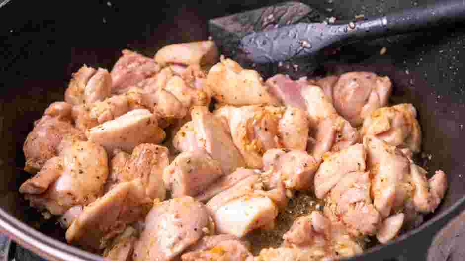 Drunken Chicken Recipe: In a second skillet over medium heat, add the olive oil and the seasoned chicken.