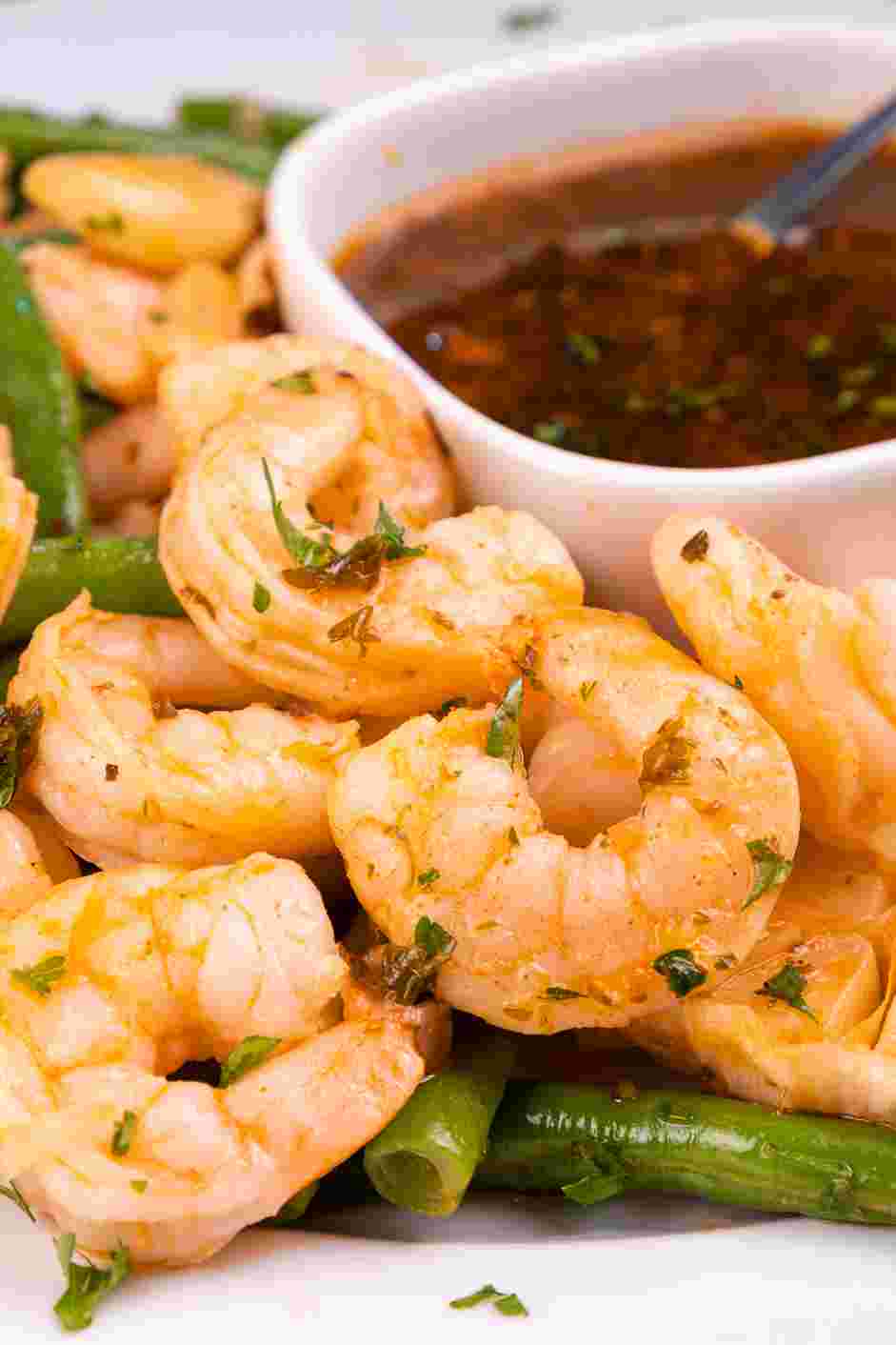 Seafood Boil Sauce Recipe: Serve topped with fresh parsley and paired with your favorite seafood.