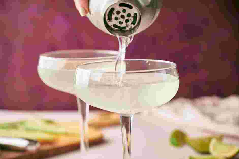 Cucumber Martini Recipe: Strain into a martini glass and garnish with cucumber slices.