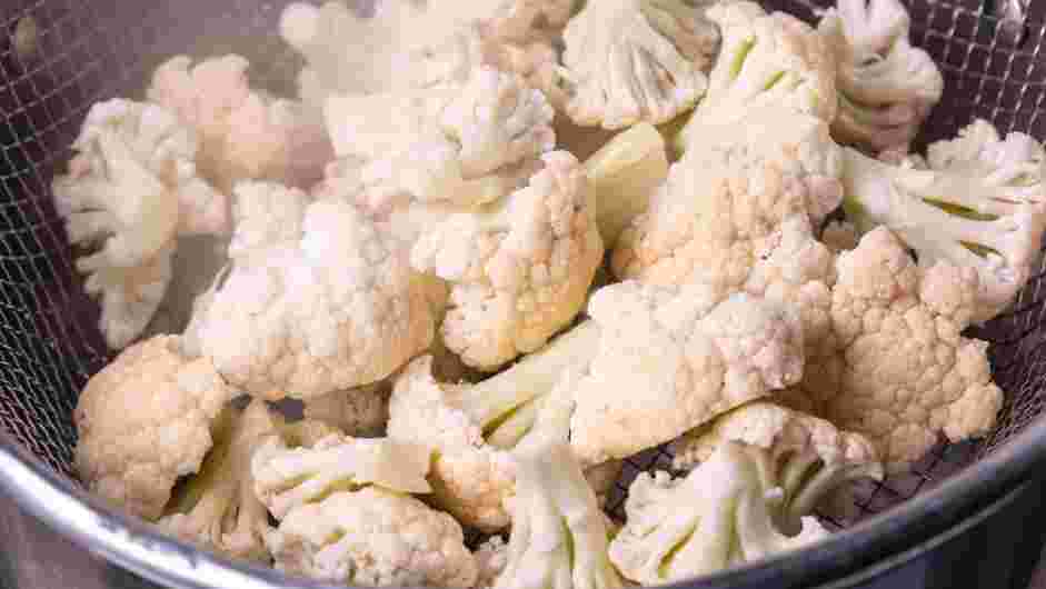 Cauliflower Au Gratin Recipe: Cover and steam for 4 minutes and remove from the heat.