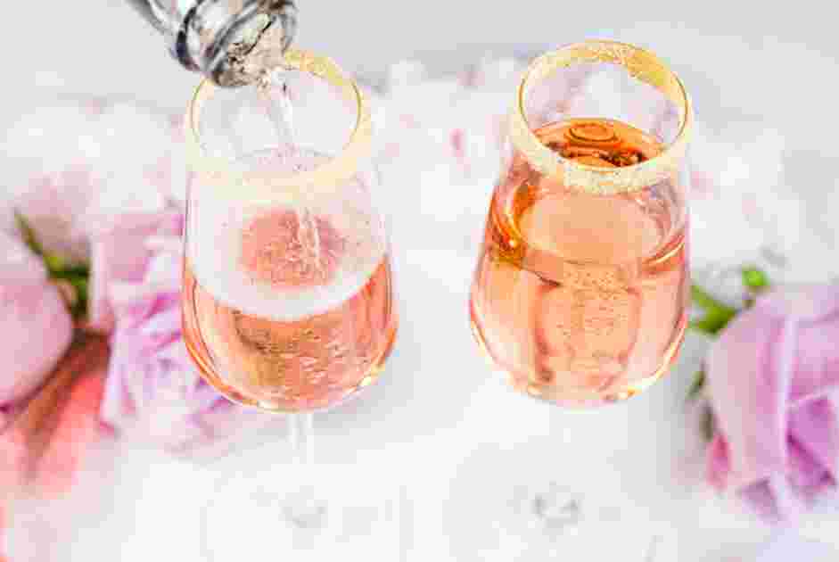 Cotton Candy Champagne Recipe: Fill the champagne flutes with champagne.
