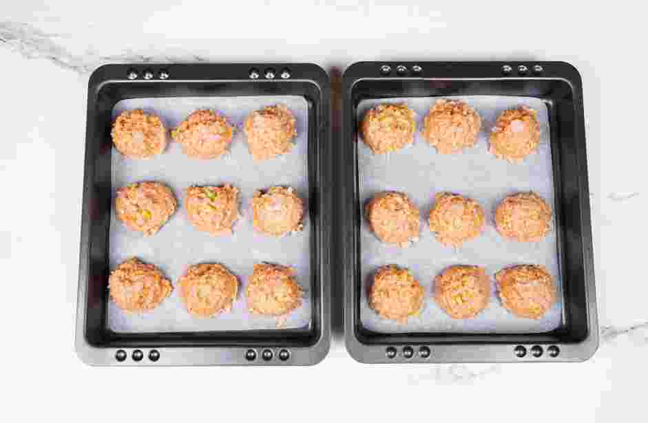 Buffalo Chicken Meatballs Recipe: Bake the meatballs for about 15-20 minutes, rotating the sheet pans halfway through until the meatballs are fully cooked.