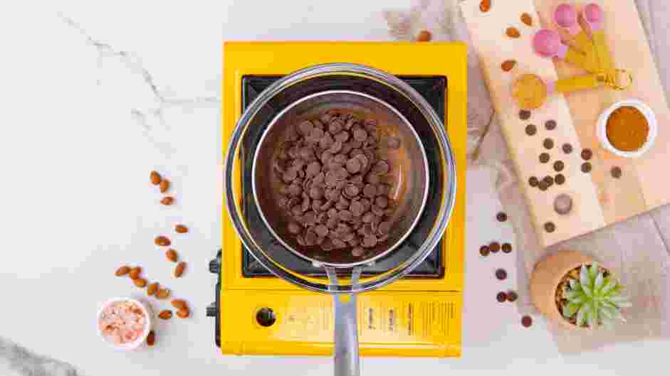 Chocolate Covered Almonds Recipe:
Prepare a double boiler by filling a small saucepan with an inch of water.
