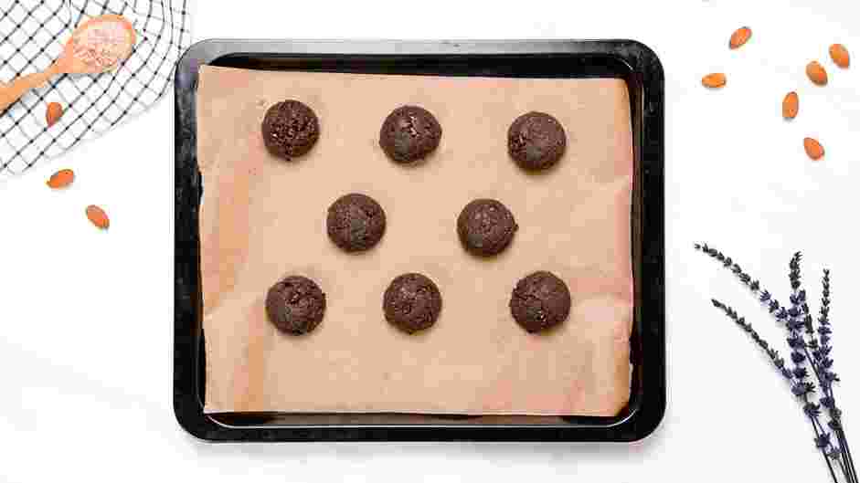 Dark Chocolate Chip Cookies Recipe: Line a baking sheet with parchment paper.