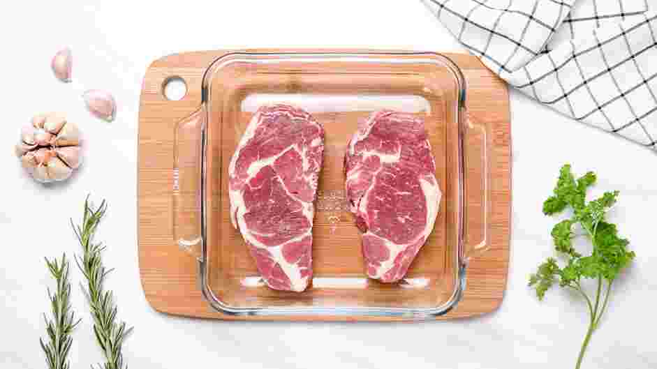 Reverse Seared Steak Recipe: Preheat the oven to 200&deg;F, In a shallow glass baking pan, place the steak into the oven.