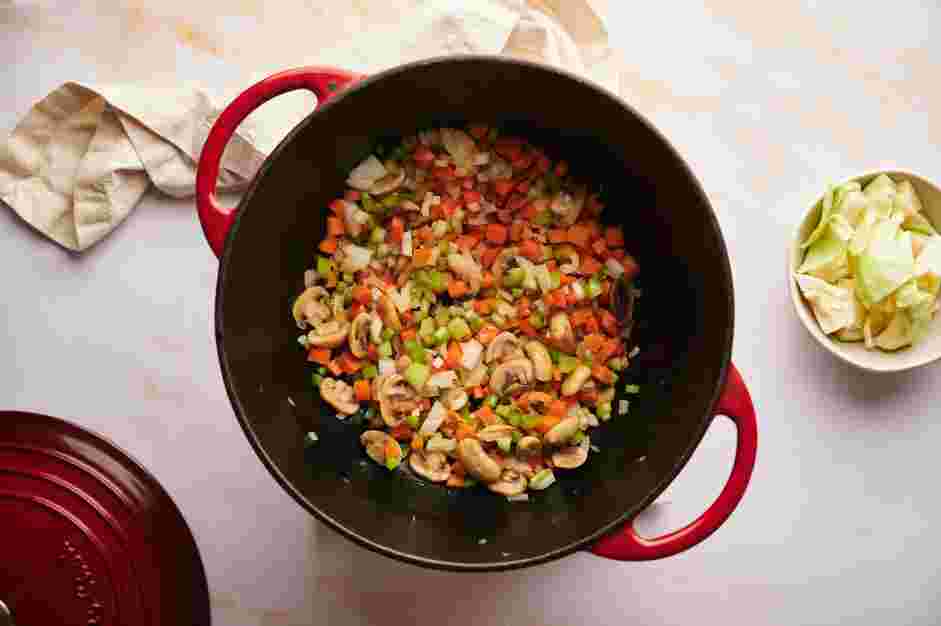 Vegetable Stew Recipe: Add the diced onions, carrots and celery.