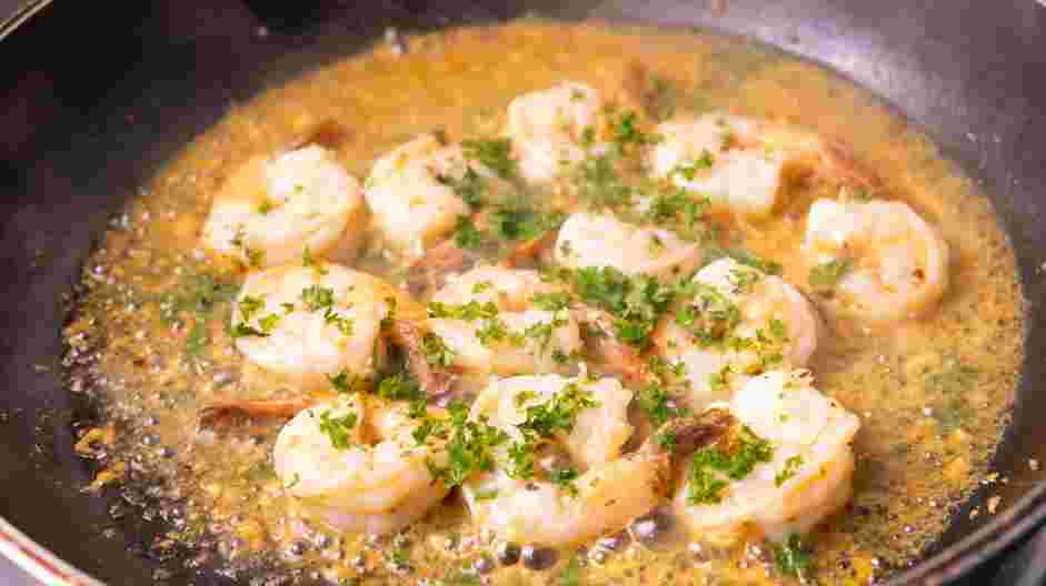 Creamy Shrimp Scampi Recipe: Flip the shrimp and add the parsley, lemon juice, salt and pepper.