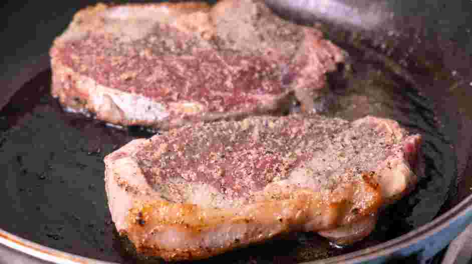 Garlic Butter Steak and Skillet Potatoes Recipe: In a saut&eacute; pan over high heat, heat the olive oil.