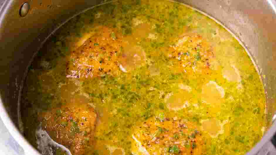 Pan Seared Chicken Thighs with Rice Recipe: Add the water or chicken stock to the pot and bring the mixture to a boil.