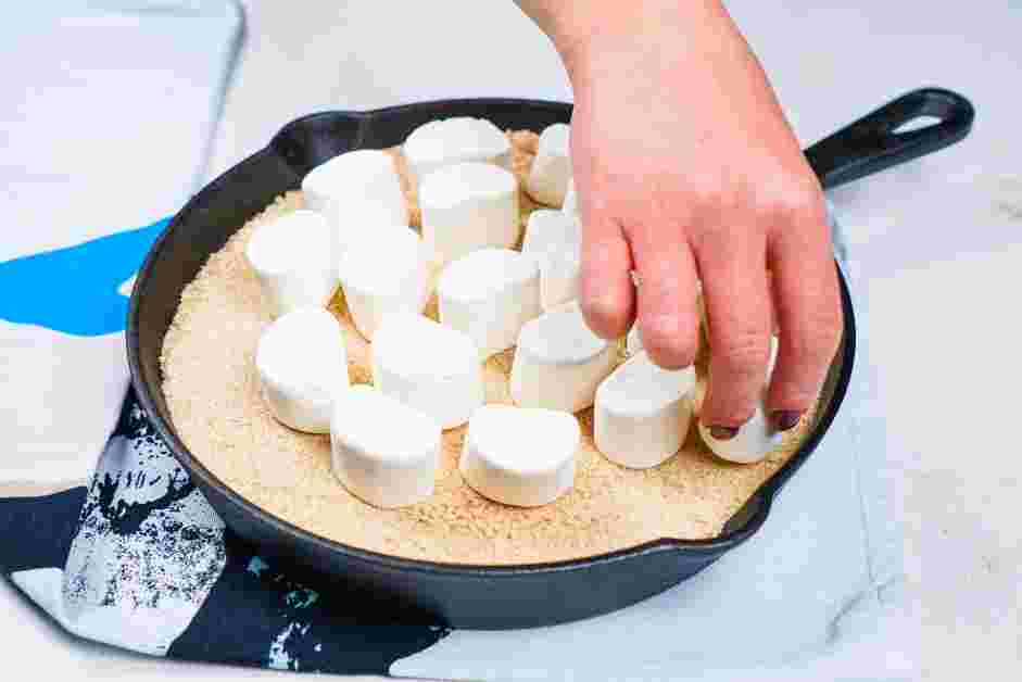 Smores Dip Recipe: Top the graham crackers with one layer of the marshmallows.