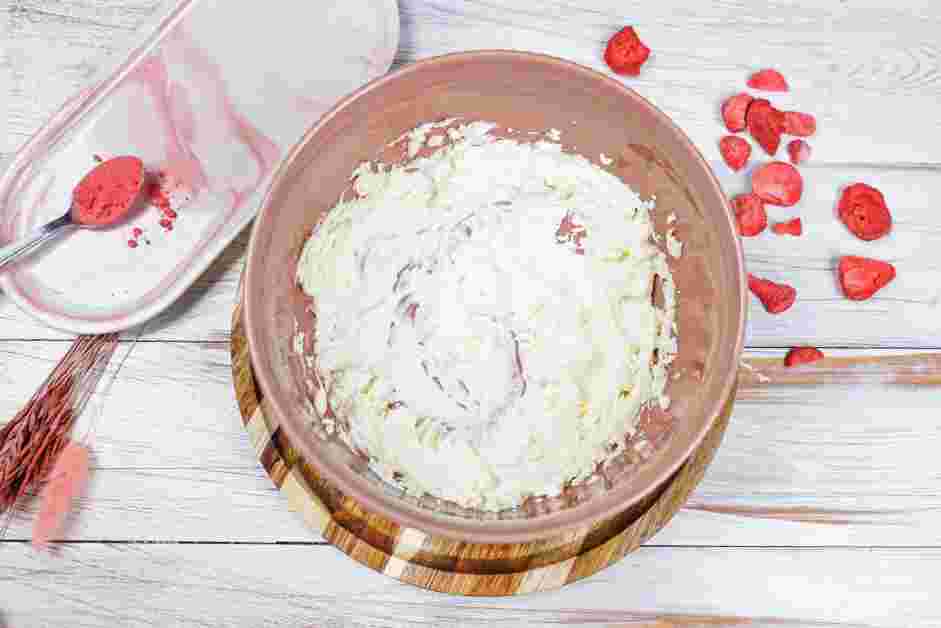 Strawberry Cream Cheese Recipe: In a mixing bowl, whip the softened cream cheese until smooth.