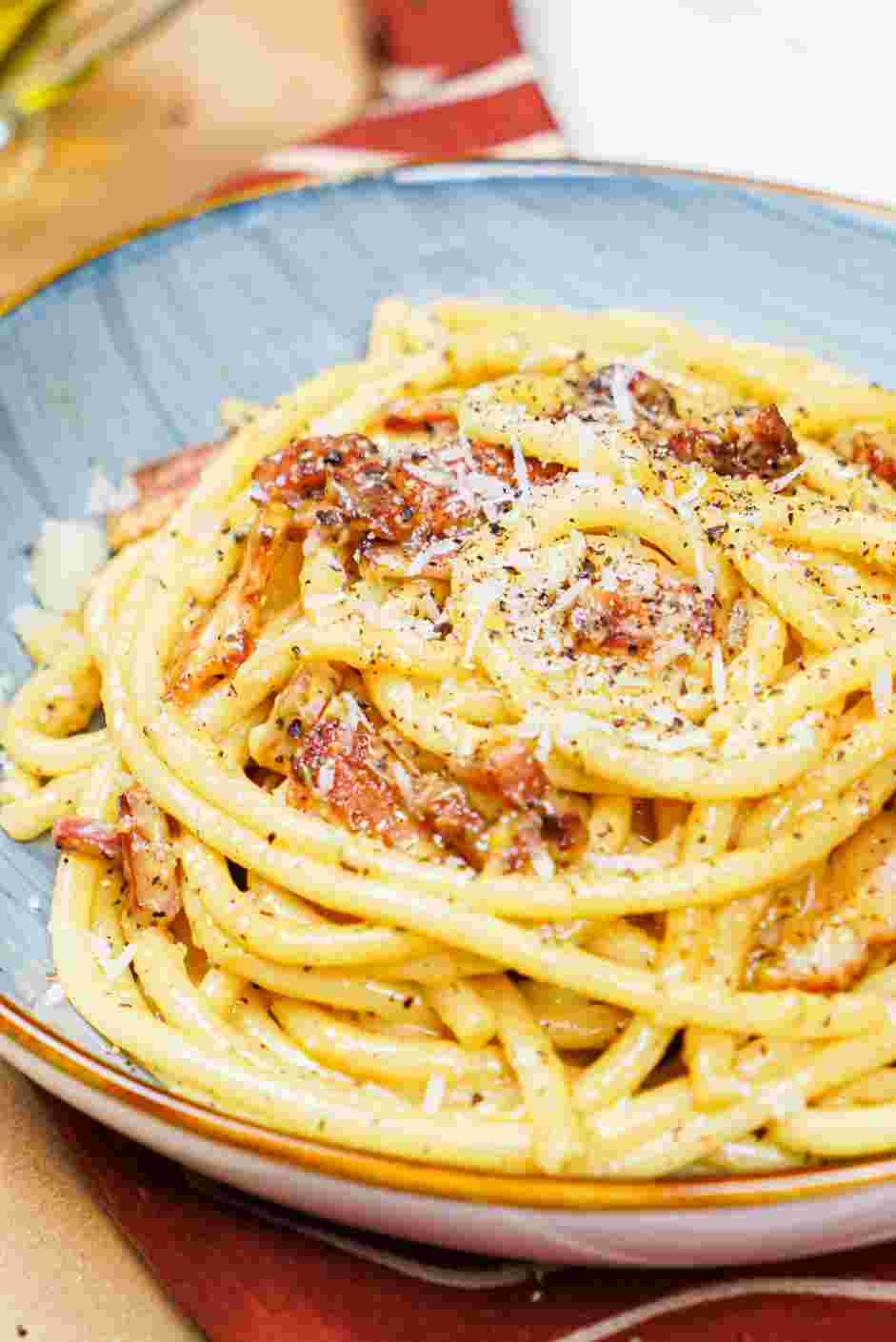 Bucatini Carbonara Recipe: Top with extra Pecorino and pepper.