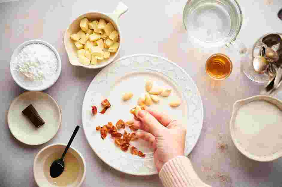 Marzipan Chocolate Recipe: Using your hands, squeeze each almond to remove the almond skins.