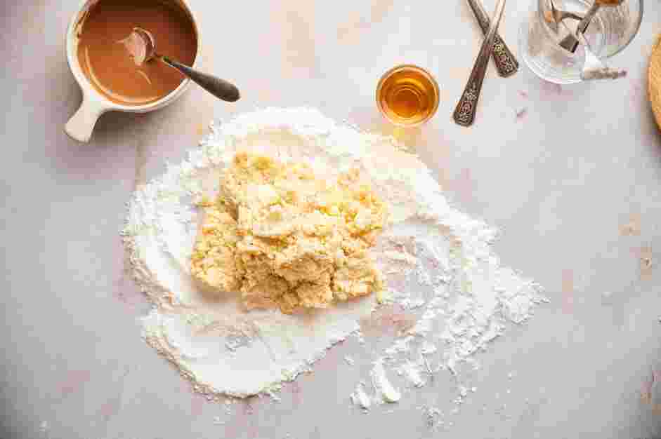 Marzipan Chocolate Recipe: Dust your work surface with powdered sugar and create a well in the center of the marzipan.