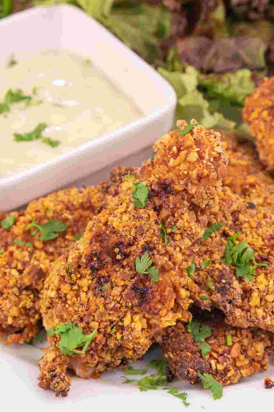 Pecan Crusted Chicken Recipe: Serve the pecan crusted chicken with a side of honey mustard dipping sauce and a side salad.