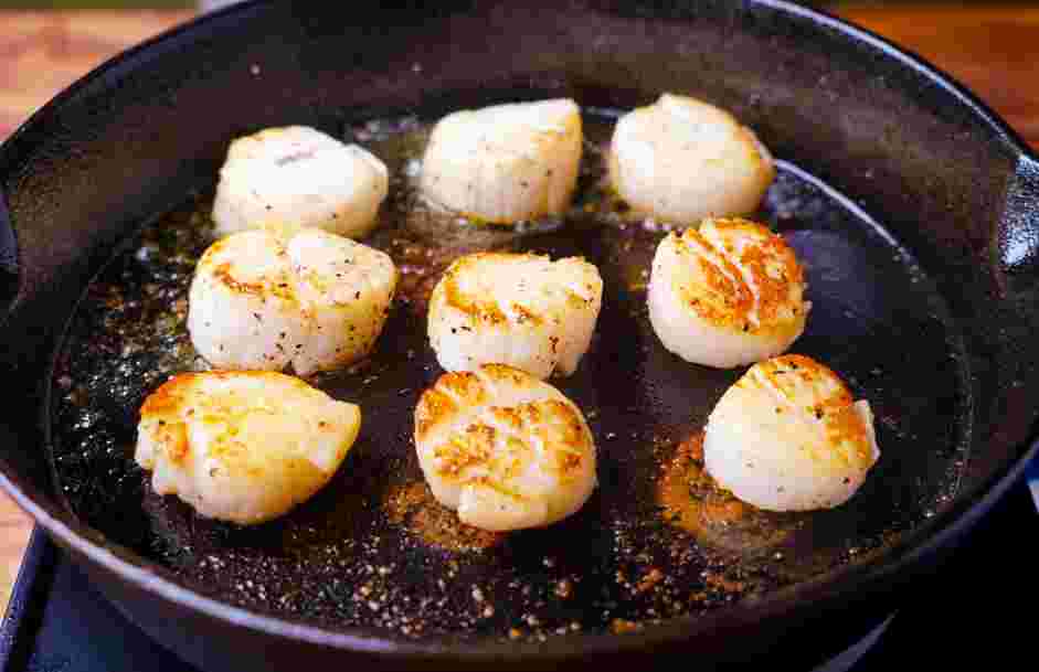 How to Cook Scallops Step 5: Flip the scallops and cook for an additional 2 minutes.
