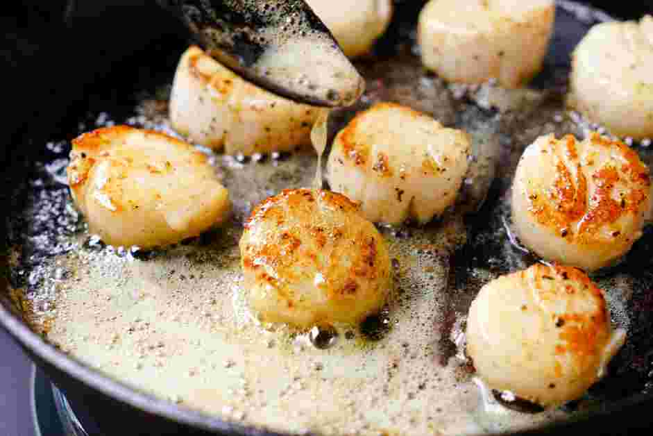 How to Cook Scallops Step 6: Add the butter to the pan.