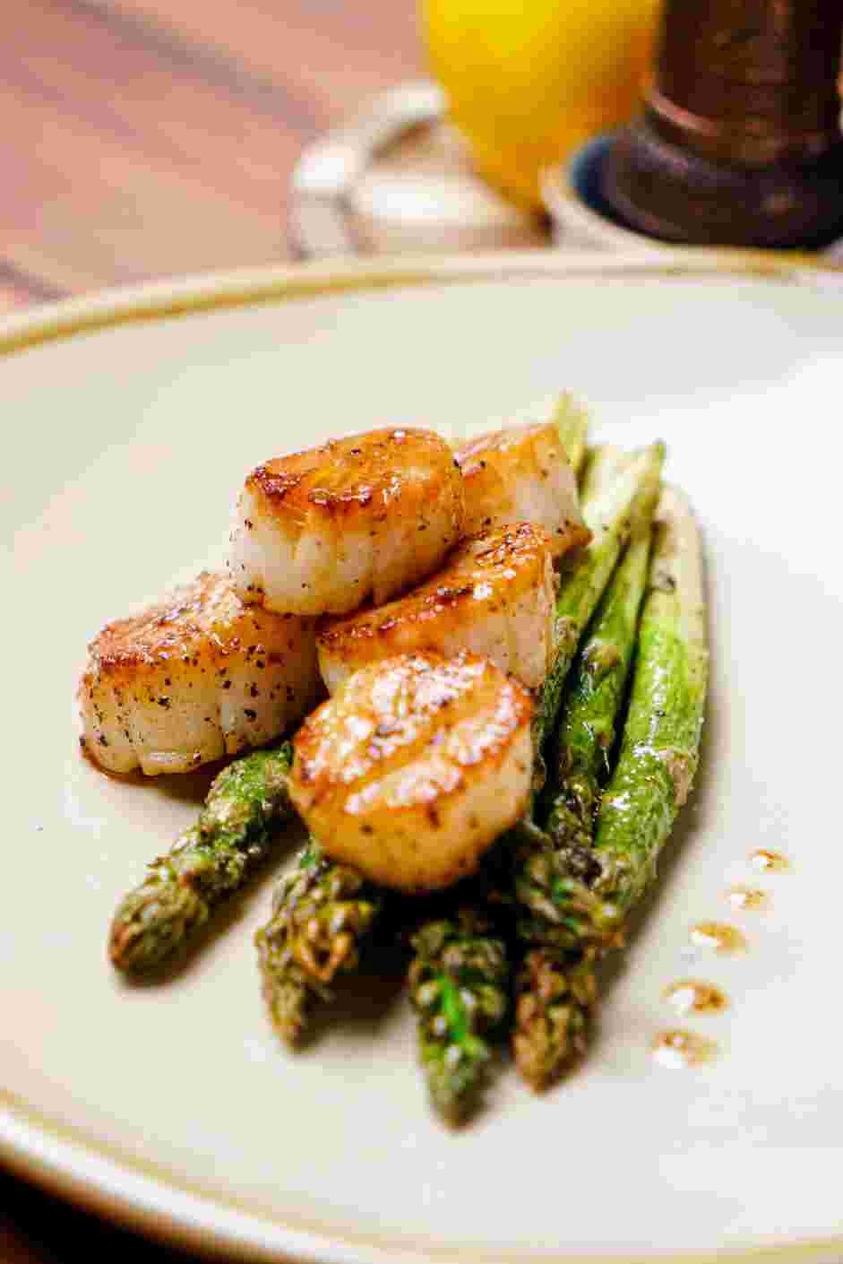 How to Cook Scallops Step 7: Serve and enjoy!