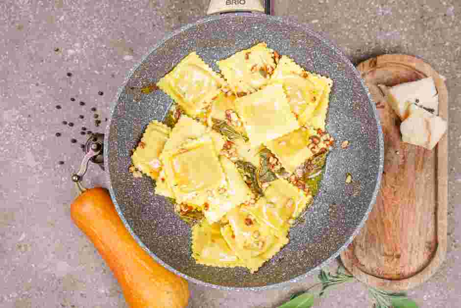 Butternut Squash Ravioli Sauce Recipe: Remove the thyme sprigs and toss the cooked butternut squash ravioli into the sauce.