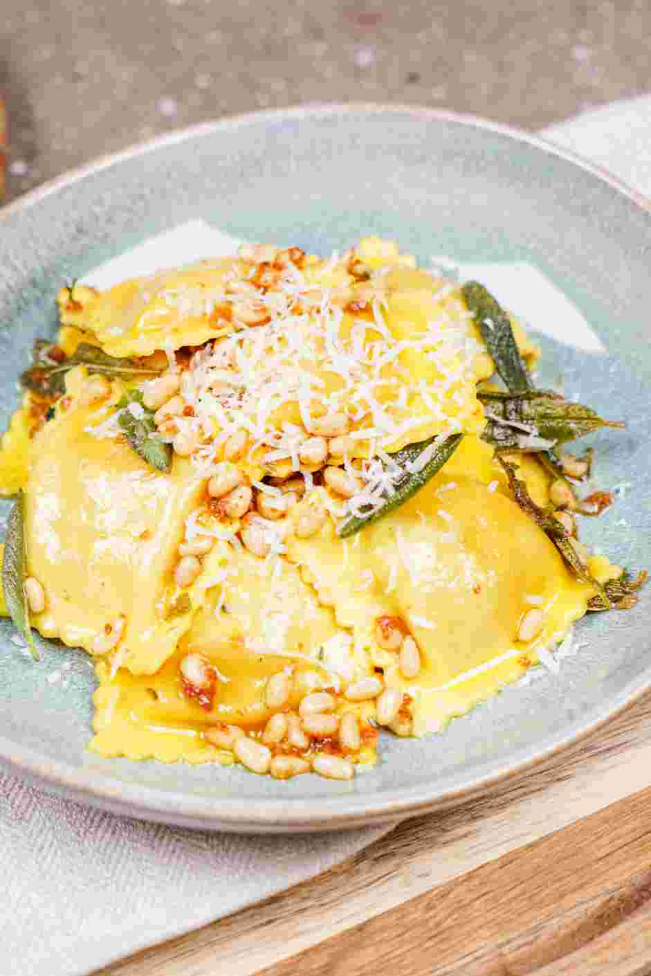 Butternut Squash Ravioli Sauce Recipe: Plate the pasta and top with more Parmesan cheese, if desired.