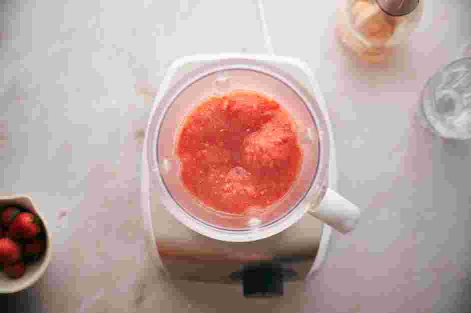 Frose Recipe: In the jar of a high-speed blender, add the frozen rose ice cubes, half of the simple syrup, frozen strawberries and lemon juice.