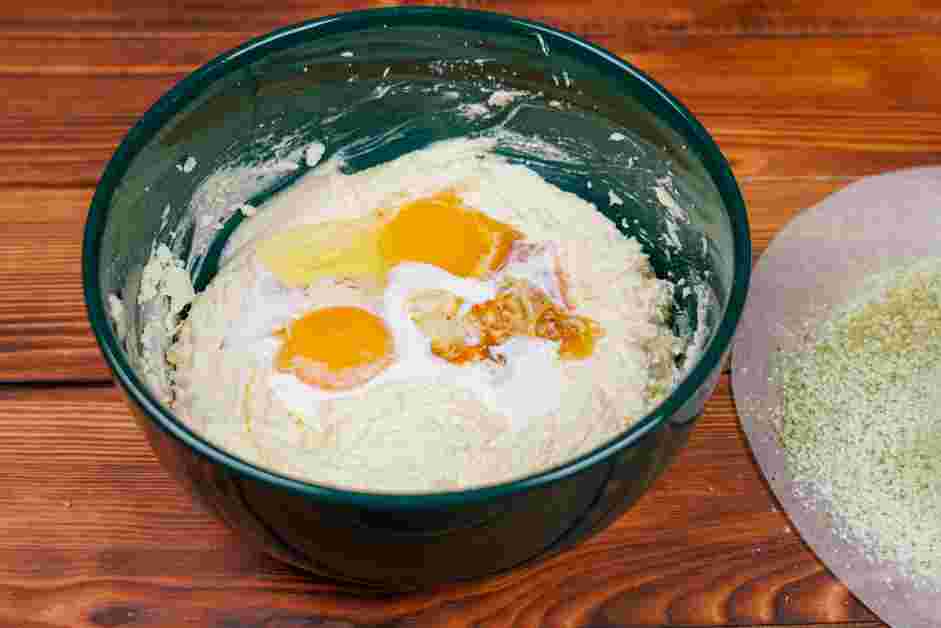 Matcha Cookies Recipe: Add the whole egg, egg yolk, cream and vanilla extract.