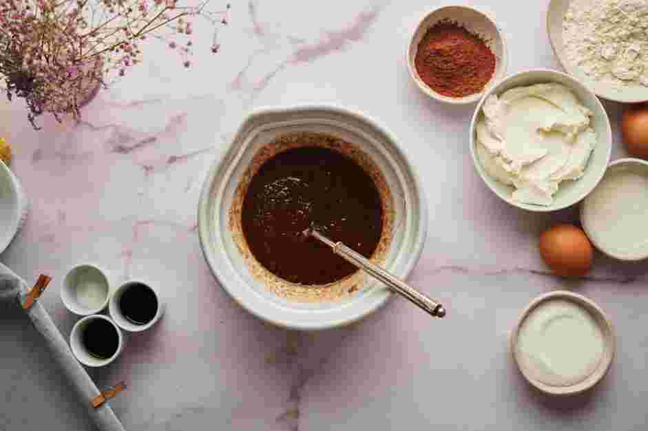 Red Velvet Brownies Recipe: In a microwave-safe bowl, add the butter, oil, chopped dark chocolate, dark brown sugar and granulated sugar.