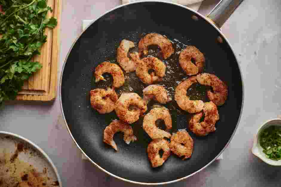 Shrimp Jambalaya Recipe: Heat the olive oil in a skillet over medium heat.