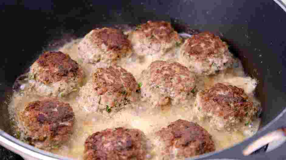 Lamb Meatballs Recipe: Add the chicken broth or water to the skillet and cover the skillet with a lid.