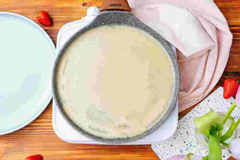 How to Make Crepes Step 6: Do Once the skillet is hot, pour three tablespoons of batter into the center of the pan.