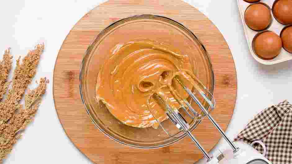 Buckeye Brownies Recipe: In a mixing bowl, use an electric mixer to beat the creamy peanut butter, softened butter and salt until well combined.