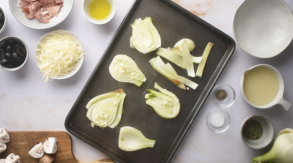 Roasted Fennel Recipe: Place the fennel and the garlic on a plate and cover with plastic wrap.