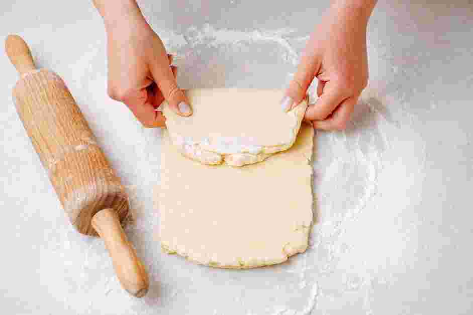 Onion Tart Recipe: Fold the dough into thirds, similar to folding a letter.