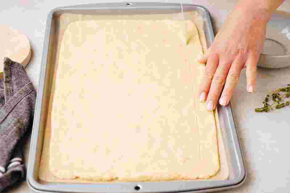 Onion Tart Recipe: When ready to use, roll the dough out in a 17x10-inch rectangle.