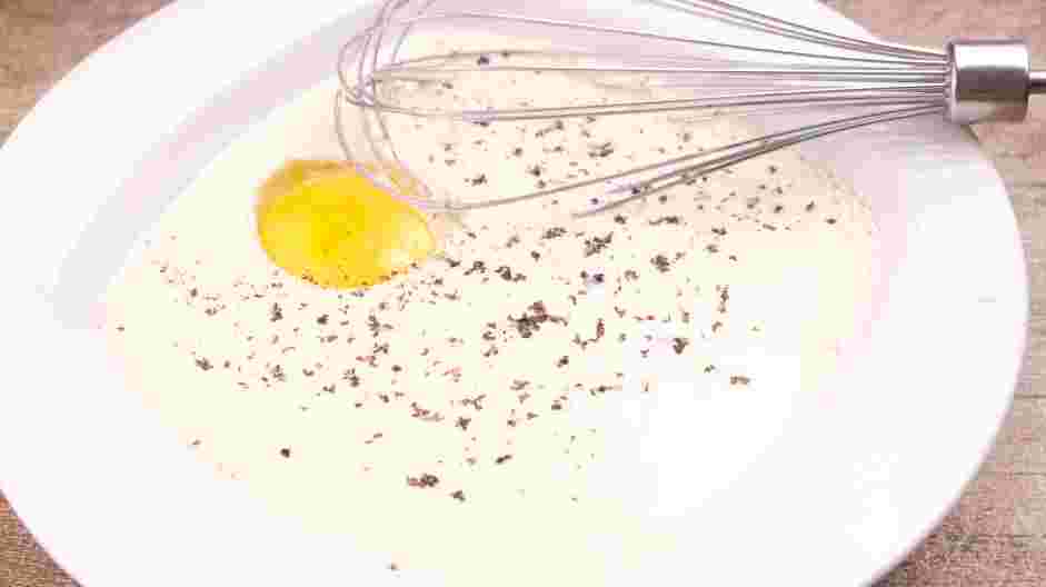 Boneless Wings Recipe: In a second shallow bowl, whisk together the egg and milk.