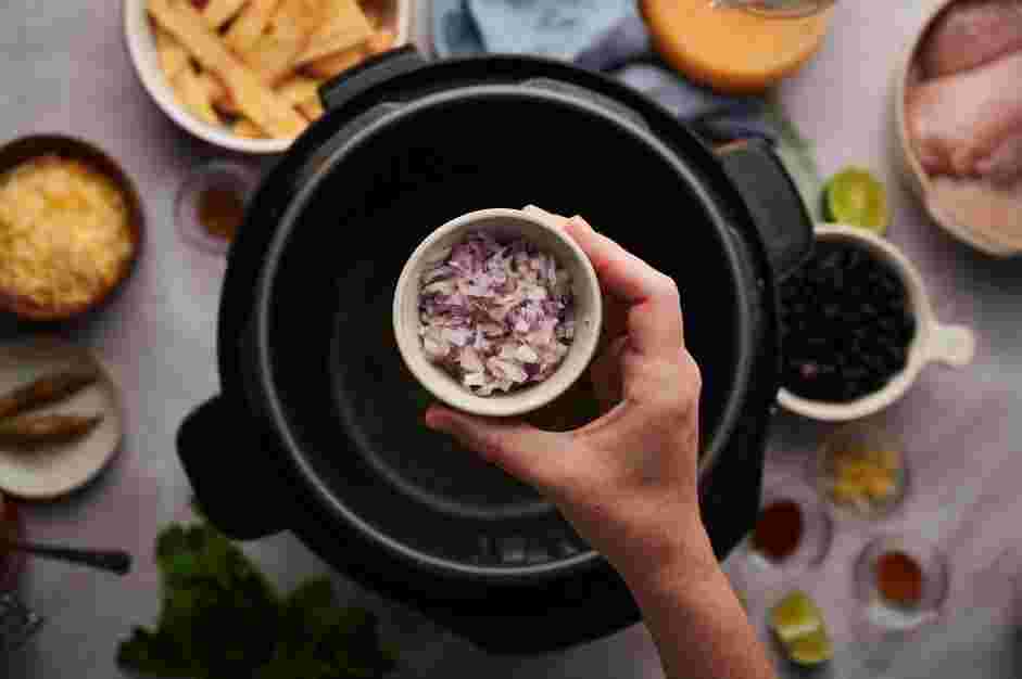 Instant Pot Chicken Tortilla Soup Recipe: Set the Instant Pot to the sauté and add the avocado or oil.