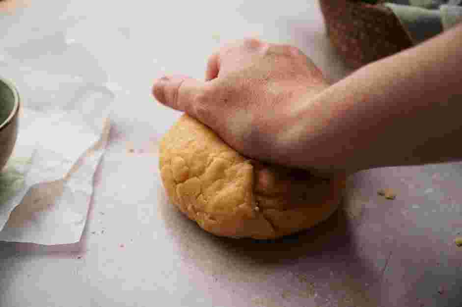 Tequenos Recipe: Transfer the dough to a lightly floured work surface and knead with your hands until a smooth pliable dough forms.