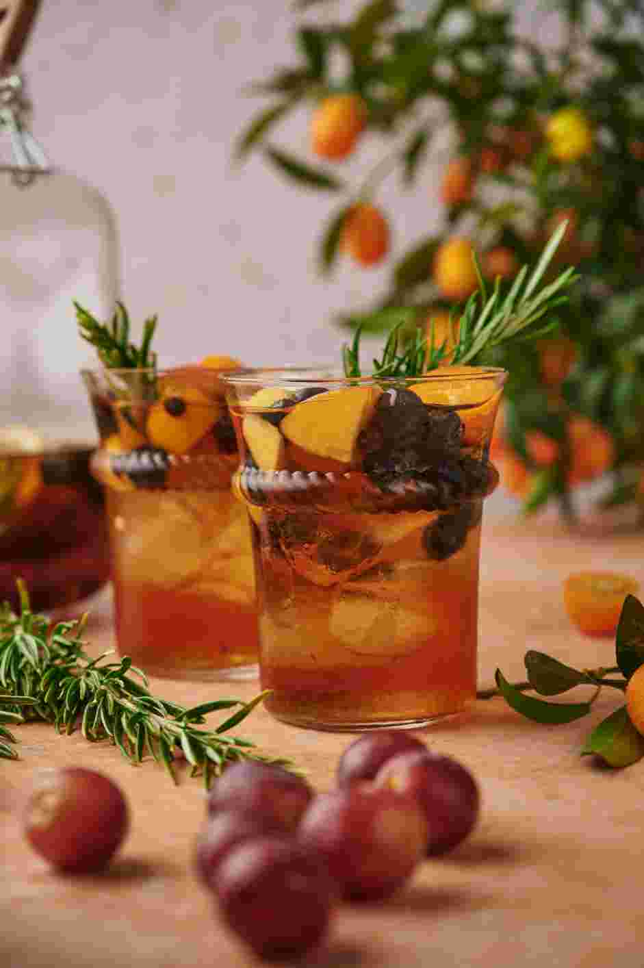 Moscato Sangria Recipe: Serve cold in wine glasses making sure you include fruit in every glass and decorate with some rosemary.