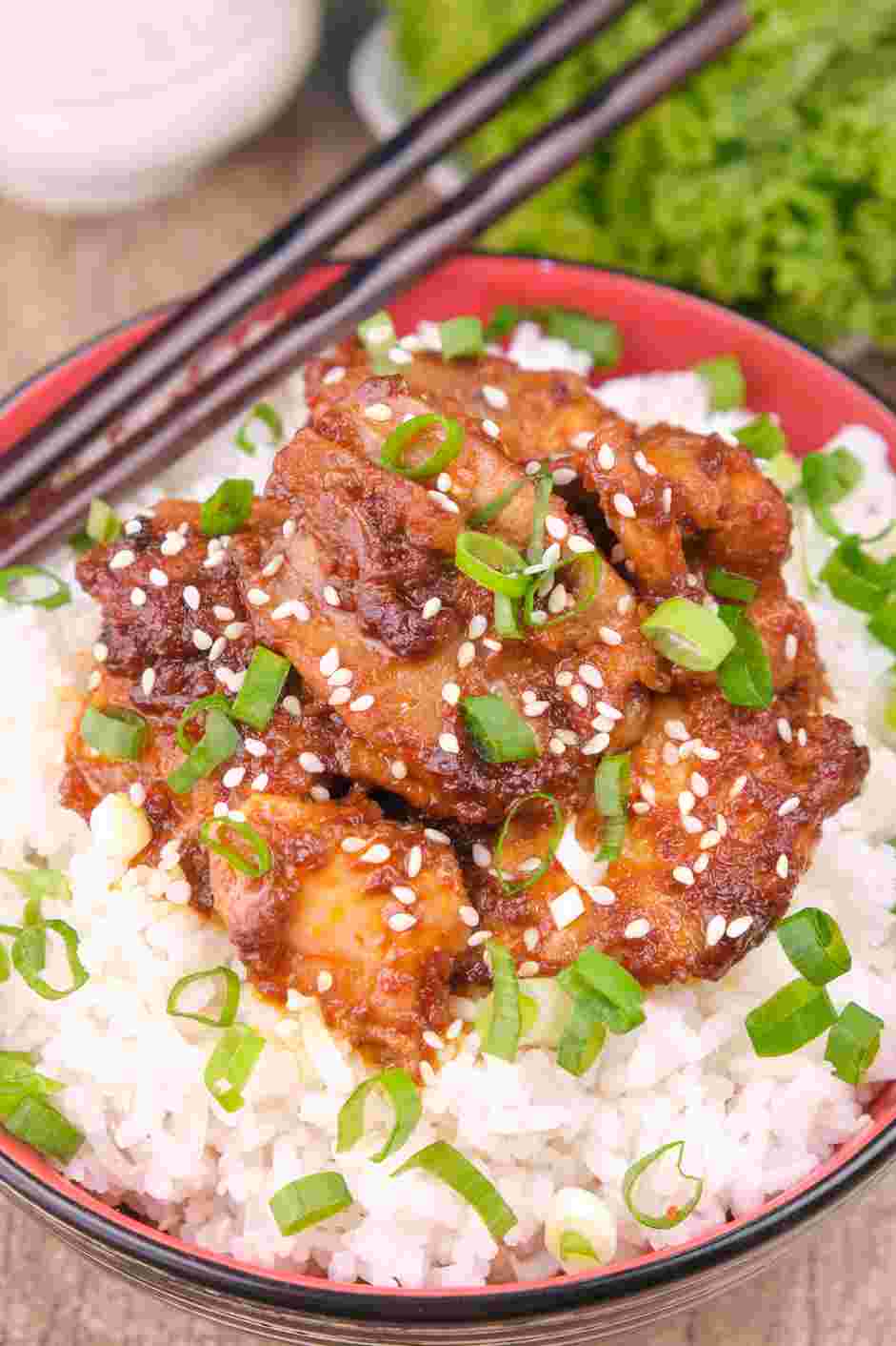 Gochujang Chicken Recipe: Garnish the gochujang chicken with finely chopped scallions and sesame seeds.