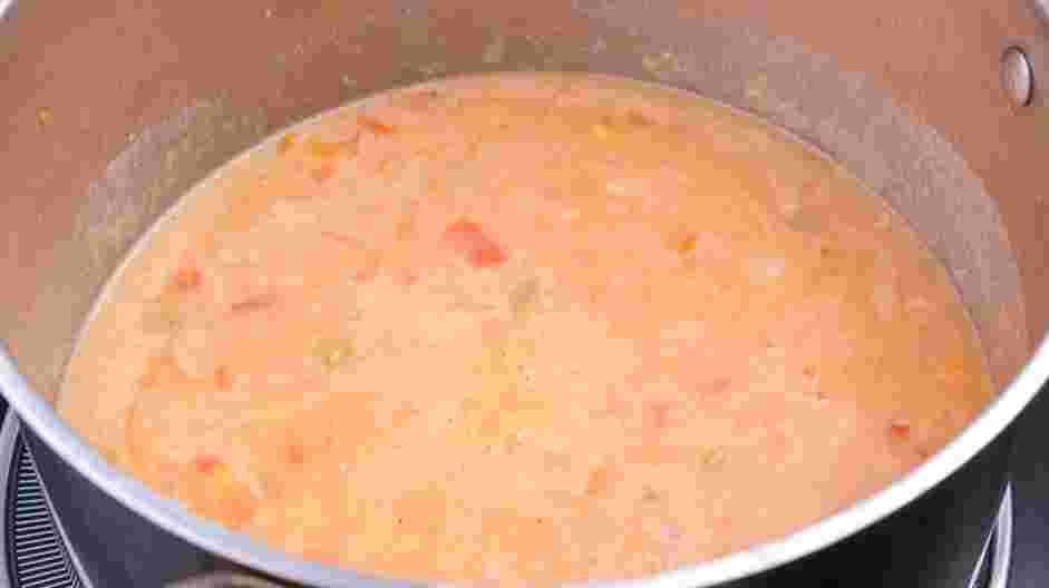 Shrimp Bisque Recipe: Add the cooked vegetables, fish sauce, cocktail sauce and salt.